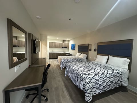 Executive Suite, 2 Queen Beds, Kitchenette | Premium bedding, memory foam beds, desk, laptop workspace