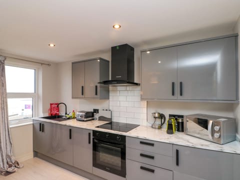 Fridge, electric kettle, toaster, cookware/dishes/utensils