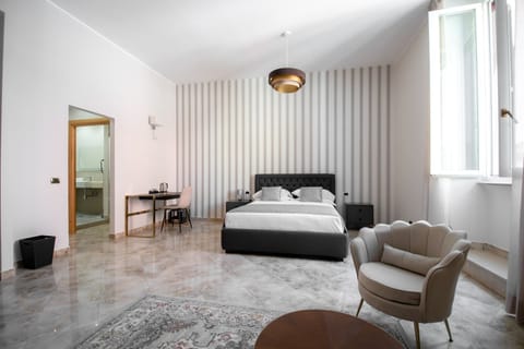 Junior Double Room, 1 Queen Bed with Sofa bed, Ensuite, City View | In-room safe, individually decorated, individually furnished, desk