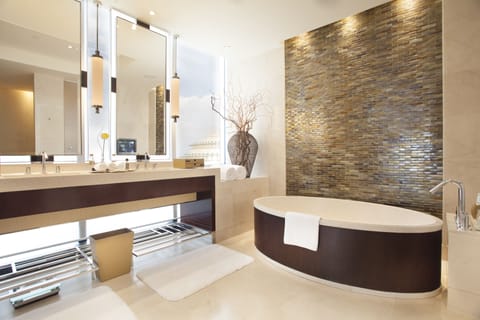 Premier Suite | Bathroom | Separate tub and shower, rainfall showerhead, designer toiletries