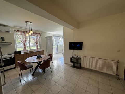 Apartment | Private kitchen | Full-size fridge, oven, toaster, cookware/dishes/utensils