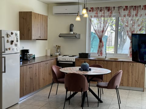 Apartment | Private kitchen | Full-size fridge, oven, toaster, cookware/dishes/utensils