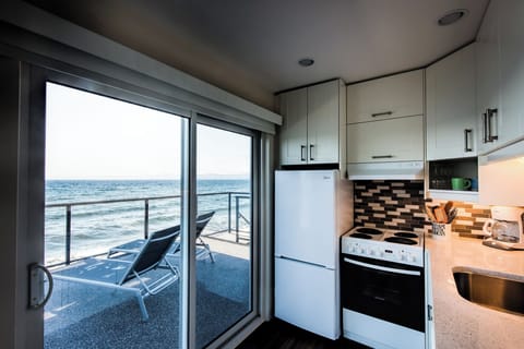 Panoramic Suite, 2 Bedrooms, Ocean View | Private kitchen | Fridge, microwave, oven, stovetop