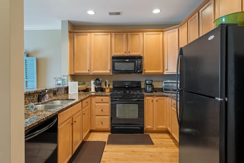 Condo, Multiple Beds, Balcony, Pool View | Private kitchen | Fridge, microwave, oven, stovetop