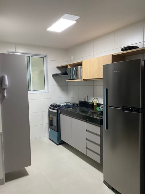 Apartment | Private kitchen | Fridge, microwave, stovetop, blender