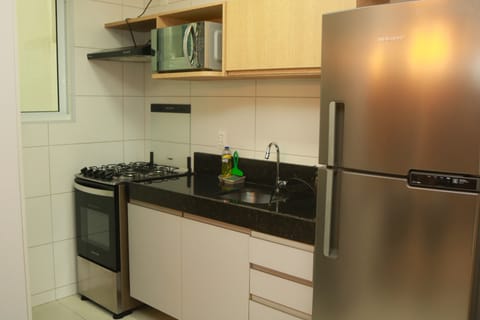 Apartment | Private kitchen | Fridge, microwave, stovetop, blender