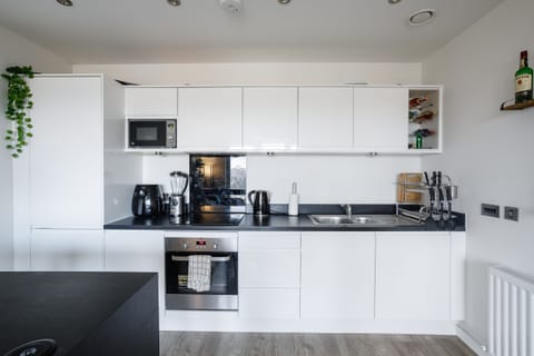 Apartment | Private kitchen | Fridge, microwave, oven, stovetop