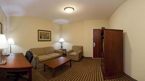 Suite, Multiple Beds | Living area | 49-inch flat-screen TV with cable channels, TV, iPod dock