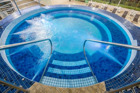 Indoor pool, open 7:00 AM to 10:00 PM, sun loungers