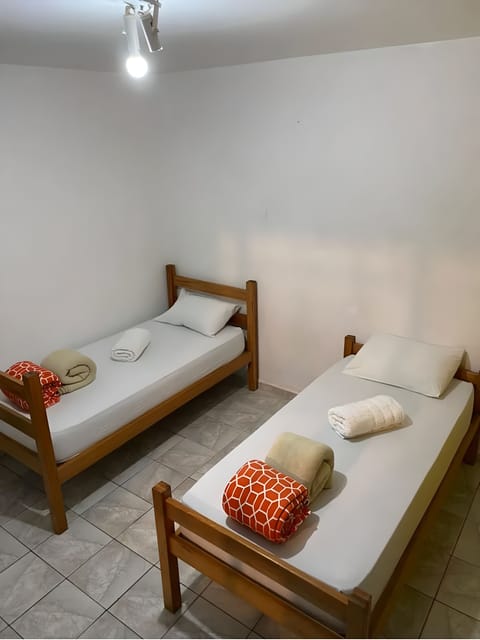 Basic Twin Room | Laptop workspace, iron/ironing board, free WiFi, bed sheets