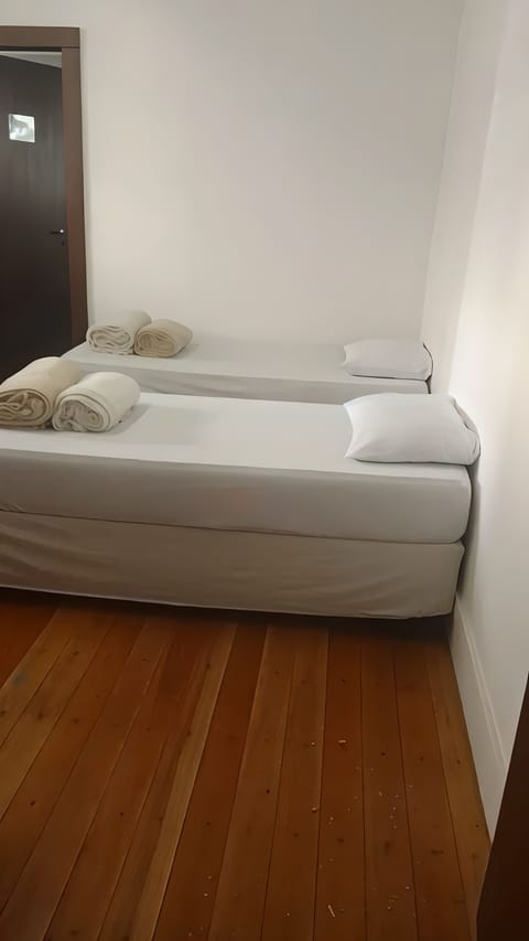 Basic Twin Room | Laptop workspace, iron/ironing board, free WiFi, bed sheets