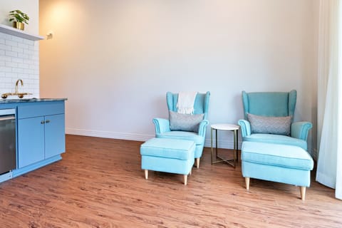 Love is Here to Stay: Ocean View King Suite | Living room | 65-inch LED TV with digital channels, streaming services