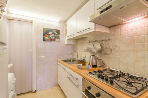 Standard Apartment, 1 Bedroom (Libeccio House) | Private kitchen | Fridge, microwave, oven, stovetop