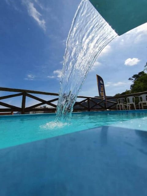 Outdoor pool, open 9:30 AM to 10:00 PM, pool umbrellas, sun loungers