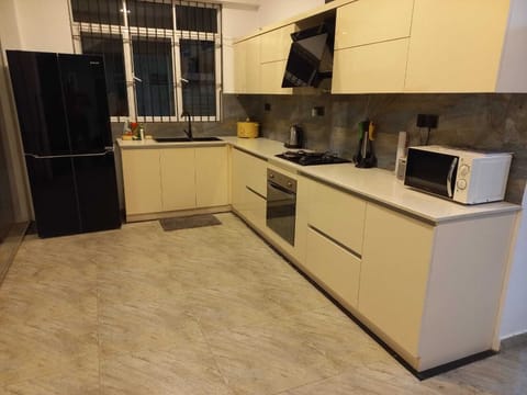 Luxury Villa | Private kitchen | Fridge, microwave, oven, electric kettle