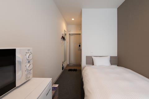 Standard Twin Room (Please note that check-in is not available after 10:00PM) | Free WiFi, bed sheets