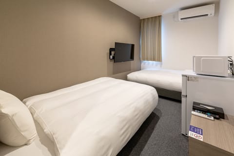 Standard Twin Room (Please note that check-in is not available after 10:00PM) | Free WiFi, bed sheets