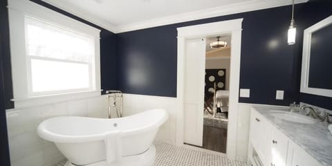 Separate tub and shower, deep soaking tub, rainfall showerhead