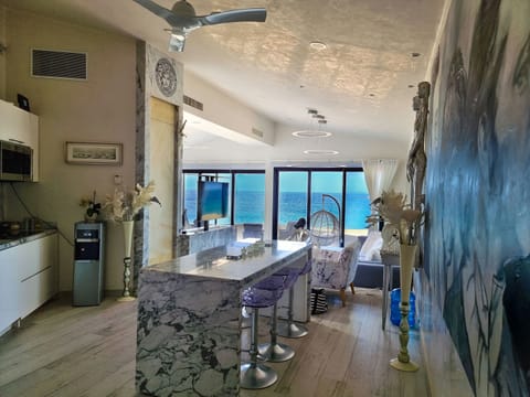 Honeymoon Condo | Private kitchen | Full-size fridge, dishwasher