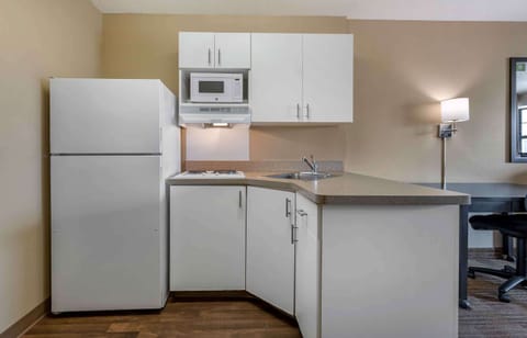 Studio, 1 King Bed, Non Smoking | Private kitchen | Fridge, microwave, stovetop