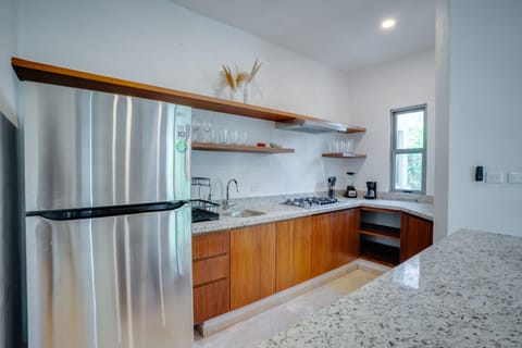 Family Apartment | Private kitchen | Full-size fridge, microwave, stovetop, coffee/tea maker