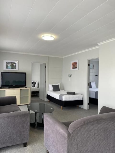 Family Apartment, 2 Bedrooms, Non Smoking, Private Bathroom | Living area | 42-inch flat-screen TV with satellite channels