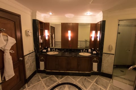 Business suite | Bathroom | Designer toiletries, hair dryer, bathrobes, slippers