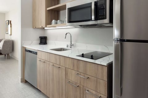 Suite, 1 King Bed (Efficiency) | Private kitchen | Full-size fridge, microwave, stovetop, dishwasher