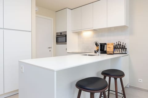 Deluxe Apartment, 2 Bedrooms, Kitchen, City View | Private kitchen | Full-size fridge, microwave, oven, stovetop