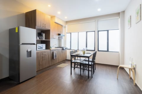 Comfort Apartment F301 | Private kitchen | Full-size fridge, microwave, stovetop, coffee/tea maker