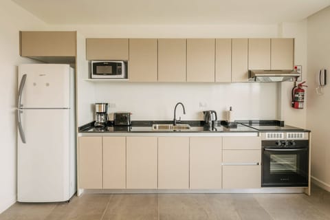 Apartment (Urbano 3) | Private kitchen | Fridge, microwave, stovetop, coffee/tea maker