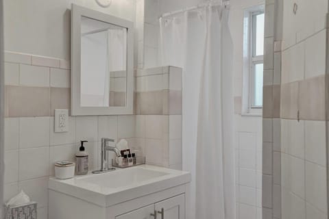 Superior Apartment, Balcony, Beach View | Bathroom | Shower, hair dryer, towels, toilet paper