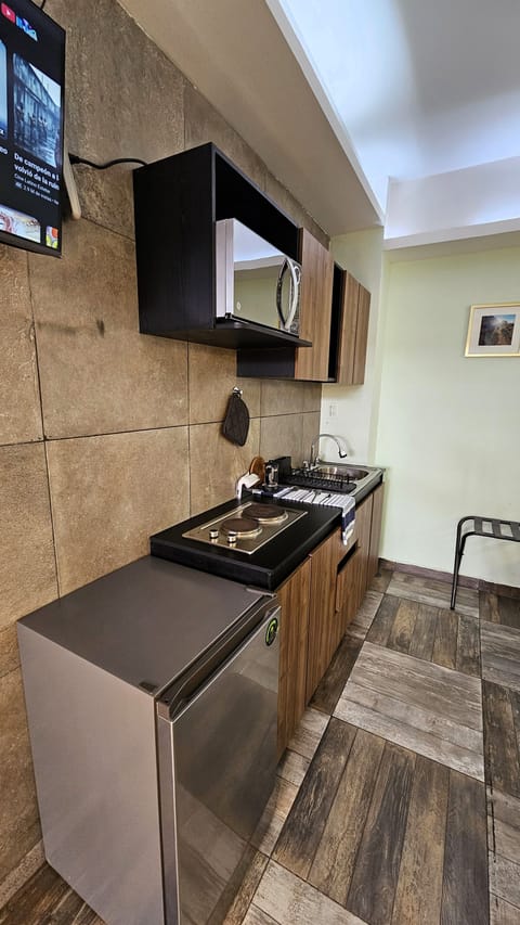 Microwave, coffee/tea maker, blender, eco-friendly cleaning products