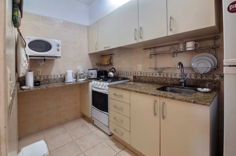 Family Apartment, Ocean View | Private kitchen | Fridge, microwave, oven, electric kettle