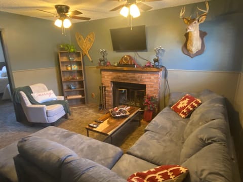 Classic Cabin, 2 Bedrooms | Living room | 32-inch LCD TV with cable channels, TV, streaming services