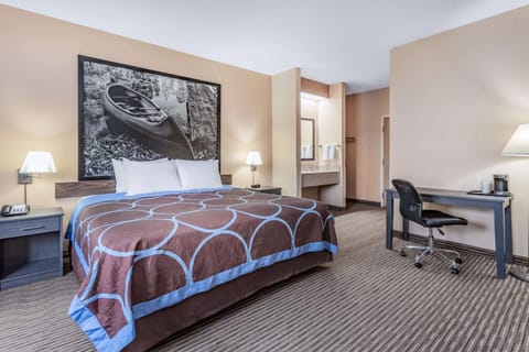 Deluxe Suite, 1 King Bed, Non Smoking | Desk, blackout drapes, iron/ironing board, rollaway beds