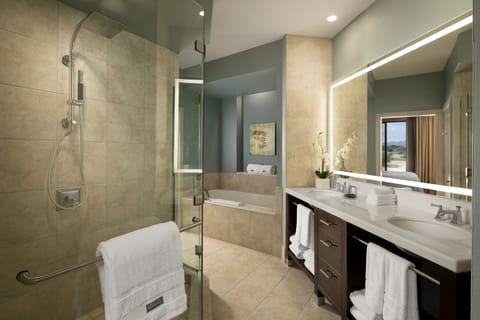 Combined shower/tub, deep soaking tub, designer toiletries, hair dryer