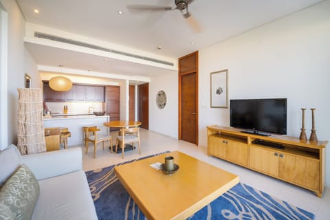 Apartment, 1 Bedroom, Balcony, Sea View | Living area | 55-inch flat-screen TV with premium channels