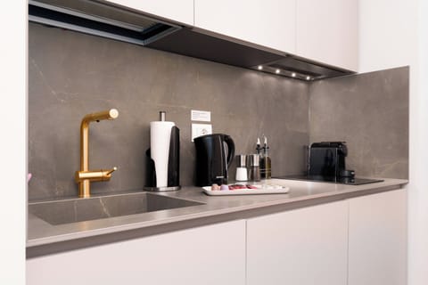 One-Bedroom Comfort Apartment | Private kitchen | Espresso maker, electric kettle