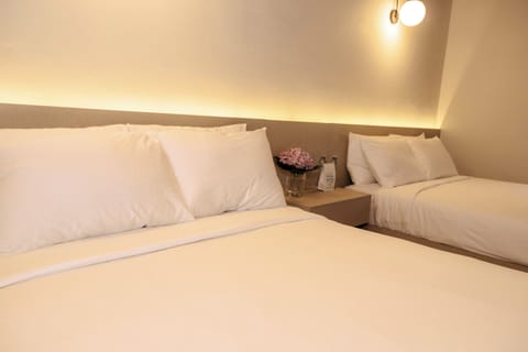 Deluxe Double Room, 2 Queen Beds | Premium bedding, down comforters, in-room safe, free WiFi