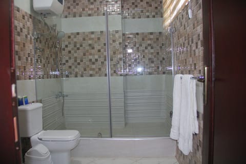 Premium Room, 1 King Bed, Accessible, Private Bathroom | Bathroom | Shower, free toiletries, bathrobes, soap