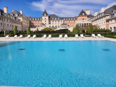 Indoor pool, seasonal outdoor pool, pool umbrellas, sun loungers