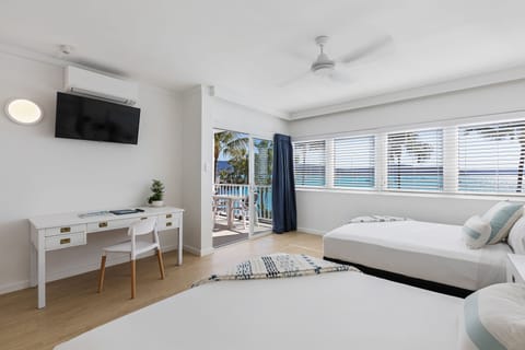 Ocean Twin Queen Room | Premium bedding, in-room safe, iron/ironing board, free WiFi