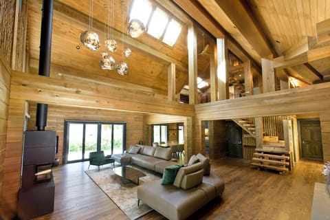 Deluxe Chalet, Mountain View | Living area | LED TV, fireplace, heated floors