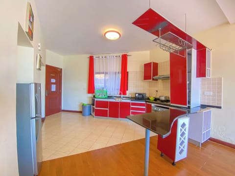 Family Apartment | Private kitchen | Fridge, microwave, oven, stovetop