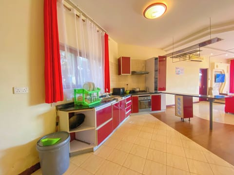 Family Apartment | Private kitchen | Fridge, microwave, oven, stovetop