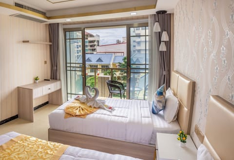 Deluxe Double or Twin Room, Pool View | In-room safe, desk, laptop workspace, free WiFi