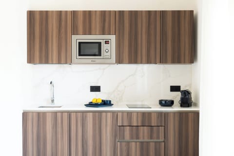 Luxury Studio Suite, Sea View | Private kitchen | Espresso maker, coffee/tea maker, eco-friendly cleaning products