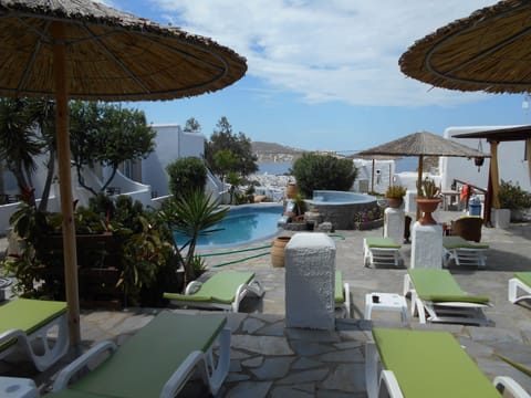 Outdoor pool, pool umbrellas, sun loungers