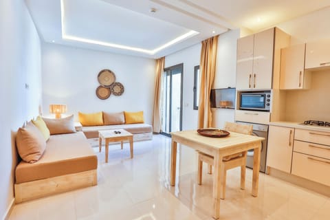 Apartment 8 | Living area | 40-inch Smart TV with satellite channels